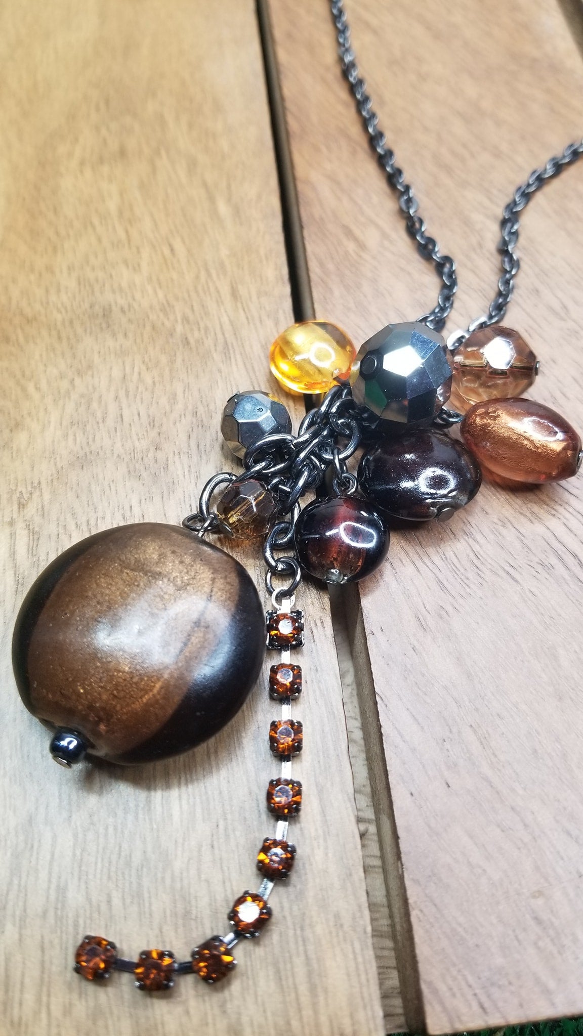 Long Charcoal and Brown Beaded Necklace with Charms