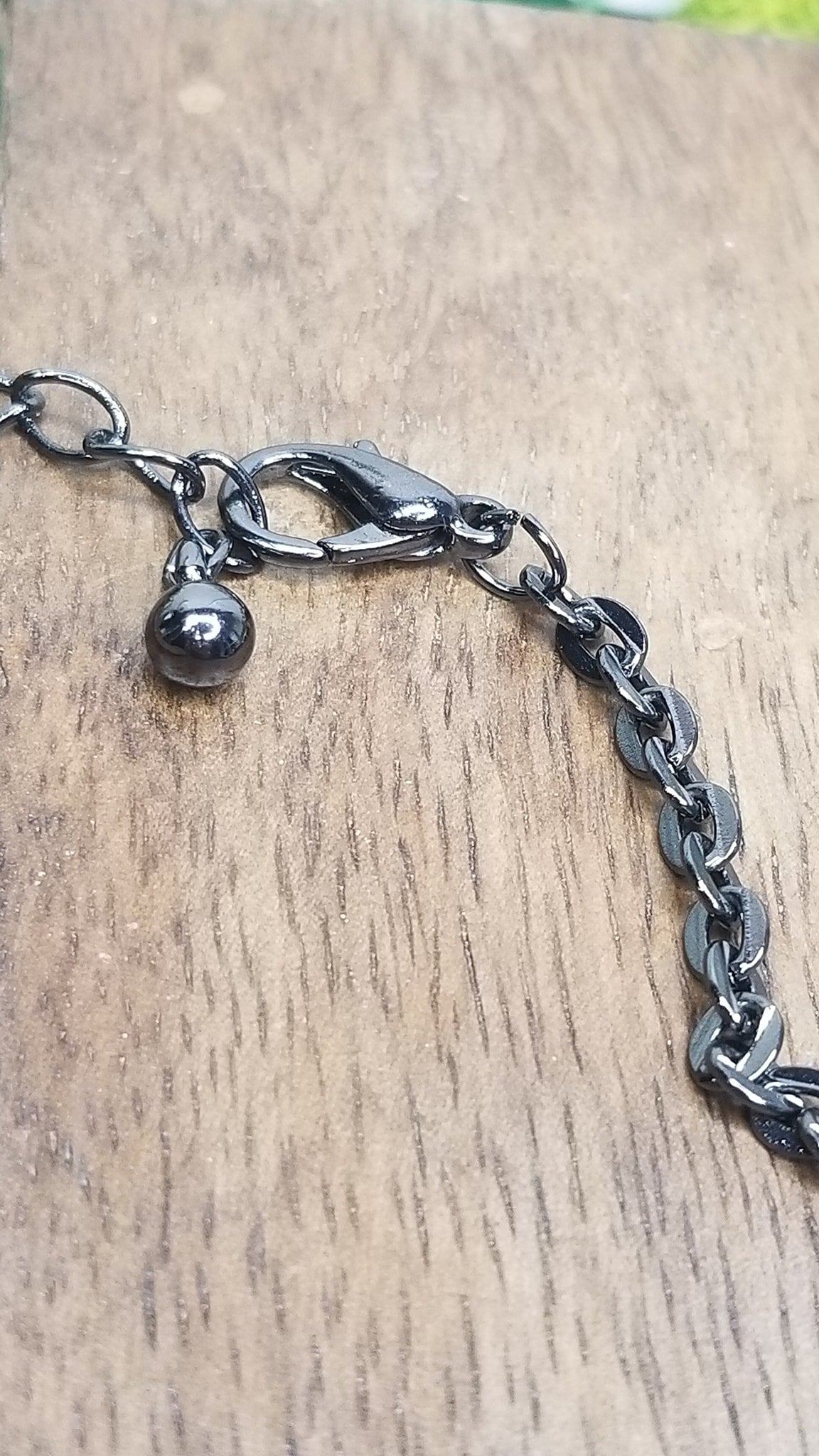 Long Charcoal and Brown Beaded Necklace with Charms